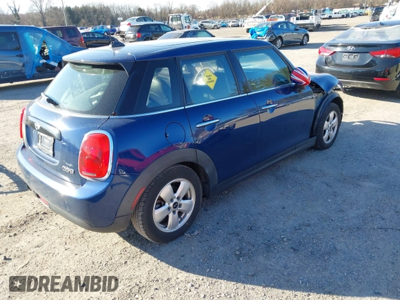 2016 MINI Hardtop 4 Door z VIN WMWXU1C54G2D09582, wystawiony jako IAAI lot #41754947 z przebiegiem 113 405 mil mil oraz . Historia ofert i sprzedaży dostępna na DreamBid. Obrazek 4.