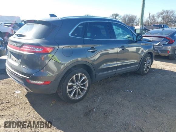 2018 Lincoln MKC Select with VIN 5LMCJ2D9XJUL08066, listed as a IAAI auction lot 41660886 with 80,070 mi miles and . Bid and sale history available at DreamBid. Image 4.
