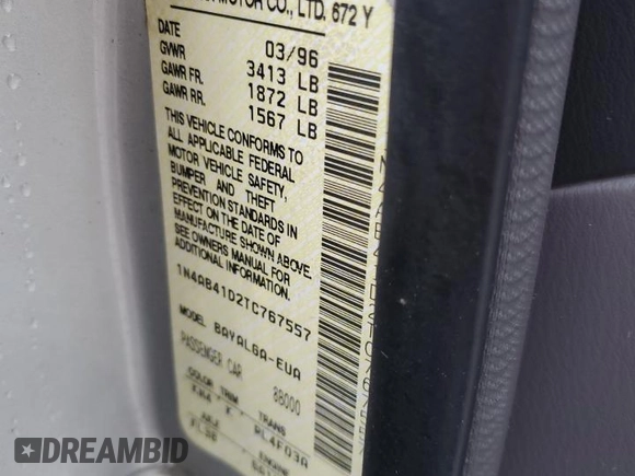 1996 Nissan Sentra XE z VIN 1N4AB41D2TC767557, wystawiony jako Copart lot #42553245 z przebiegiem 148 514 mil mil oraz Szkoda całkowita • Salvage title. Historia ofert i sprzedaży dostępna na DreamBid. Obrazek 14.