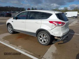 2013 Ford Escape SEL with VIN 1FMCU9H94DUB29989, listed as a IAAI auction lot 42075895 with 147,242 mi miles and . Bid and sale history available at DreamBid. Image 3.