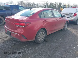 2023 Kia Rio S with VIN 3KPA24AD9PE512896, listed as a IAAI auction lot 41209063 with 32,505 mi miles. Bid and sale history available at carsss.com. Image 4.