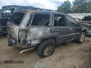2004 Jeep Grand Cherokee Limited with VIN 1J8GW58J34C363977, listed as a Copart auction lot 61049485 with 162,329 mi miles and Salvage title. Bid and sale history available at DreamBid. Image 3.