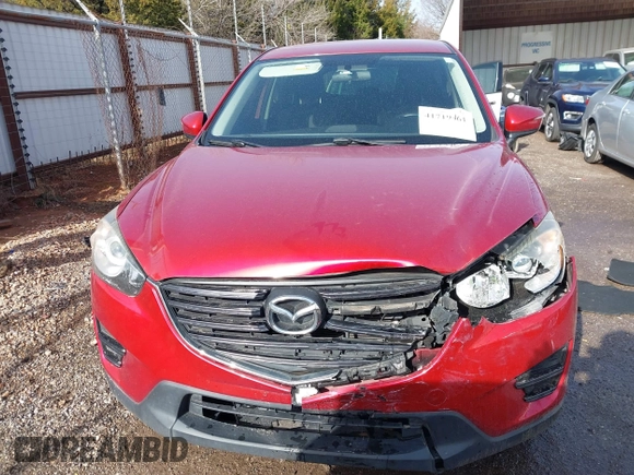 2016 Mazda CX-5 Sport with VIN JM3KE2BY3G0754391, listed as a IAAI auction lot 41719461 with 79,130 mi miles. Bid and sale history available at carsss.com. Image 12.