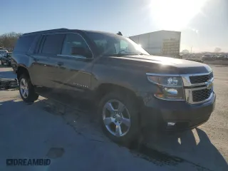 2017 Chevrolet Suburban LT with VIN 1GNSCHKCXHR333097, listed as a Copart auction lot 48255185 with 120,590 mi miles and Salvage Title. Bid and sale history available at carsss.com. Image 4.