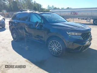 2023 Kia Sorento SX z VIN 5XYRK4LF9PG191513, wystawiony jako IAAI lot #40940500 z przebiegiem 21 859 mil mil oraz . Historia ofert i sprzedaży dostępna na DreamBid. Obrazek 1.
