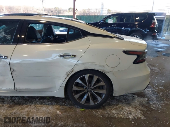 2020 Nissan Maxima Platinum with VIN 1N4AA6FV5LC385023, listed as a IAAI auction lot 41340116 with 82,924 mi miles and . Bid and sale history available at DreamBid. Image 18.