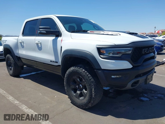 2022 Ram 1500 TRX with VIN 1C6SRFU95NN245954, listed as a IAAI auction lot 42032210 with 30,870 mi miles and . Bid and sale history available at DreamBid. Image 1.