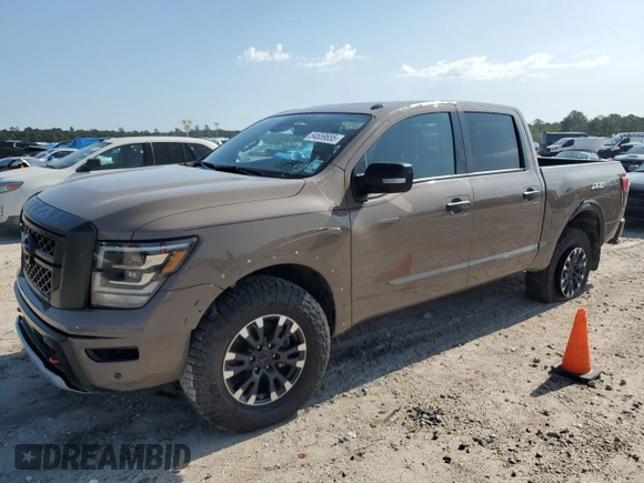 2021 Nissan Titan Pro-4X с VIN 1N6AA1ED2MN533749, выставлен на аукционе Copart как лот 54659655 с пробегом Не указан миль и Списание • Salvage title. История ставок и продаж доступна на DreamBid. Изображение 1.