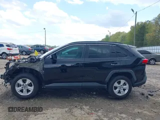 2019 Toyota RAV4 XLE with VIN 2T3W1RFV8KW001328, listed as a IAAI auction lot 41961320 with 100,678 mi miles and . Bid and sale history available at DreamBid. Image 15.