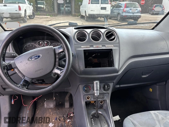 2012 Ford Transit Connect XLT с VIN NM0LS7BN2CT116535, выставлен на аукционе Copart как лот 64290765 с пробегом 135 637 миль миль и Чистый • Clean title. История ставок и продаж доступна на DreamBid. Изображение 9.