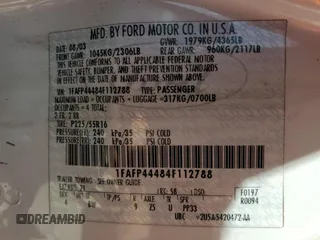 2004 Ford Mustang Deluxe with VIN 1FAFP44484F112788, listed as a Copart auction lot 58056134 with 190,207 mi miles and Non Repairable. Bid and sale history available at carsss.com. Image 13.
