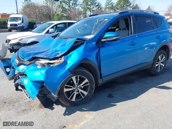 2018 Toyota RAV4 XLE with VIN JTMWFREV7JJ730968, listed as a IAAI auction lot 41778761 with 122,102 mi miles. Bid and sale history available at carsss.com. Image 2.