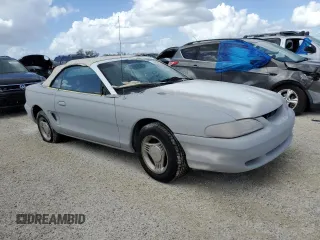 1995 Ford Mustang with VIN 1FALP4444SF177184, listed as a Copart auction lot 78695874 with 119,729 mi miles and Salvage title. Bid and sale history available at DreamBid. Image 4.