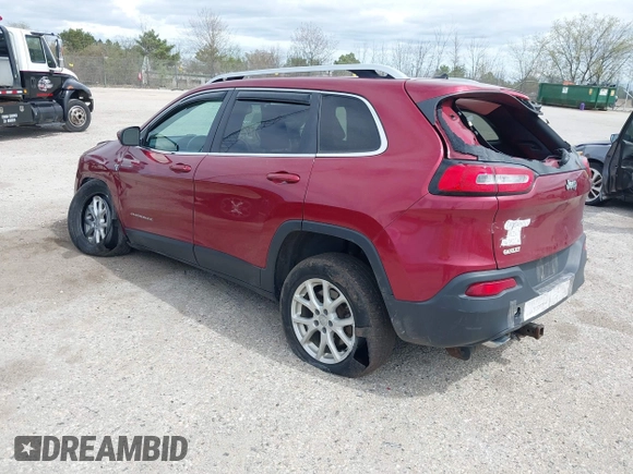 2014 Jeep Cherokee Latitude with VIN 1C4PJLCS3EW143362, listed as a IAAI auction lot 42150037 with 86,012 mi miles. Bid and sale history available at carsss.com. Image 3.