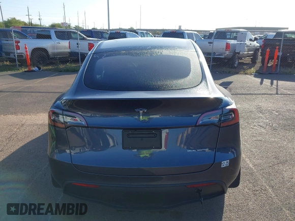 2023 Tesla Model Y Long Range with VIN 7SAYGDEE0PF928836, listed as a IAAI auction lot 41538742 with 9,630 mi miles and . Bid and sale history available at DreamBid. Image 16.