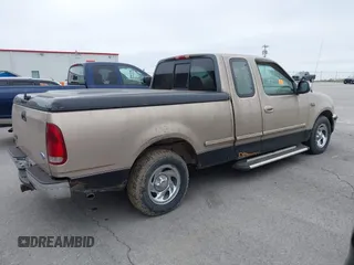 1997 Ford F-150 with VIN 2FTEX17L2VCA10536, listed as a IAAI auction lot 41917990 with 296,879 mi miles and . Bid and sale history available at DreamBid. Image 4.