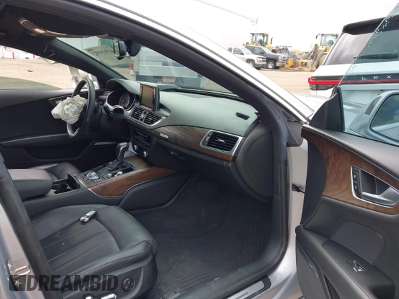 2016 Audi A7 3.0 Prestige with VIN WAU2GAFC0GN103537, listed as a IAAI auction lot 41915392 with 75,879 mi miles. Bid and sale history available at carsss.com. Image 5.