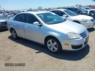 2009 Volkswagen Jetta SE z VIN 3VWRZ71K19M052461, wystawiony jako IAAI lot #42299760 z przebiegiem 84 297 mil mil oraz . Historia ofert i sprzedaży dostępna na DreamBid. Obrazek 1.
