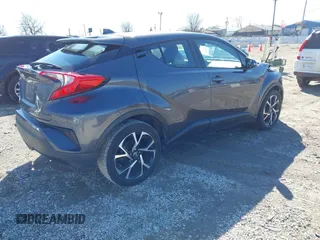 2018 Toyota C-HR XLE z VIN NMTKHMBX5JR042941, wystawiony jako IAAI lot #41803153 z przebiegiem 110 220 mil mil oraz . Historia ofert i sprzedaży dostępna na DreamBid. Obrazek 4.