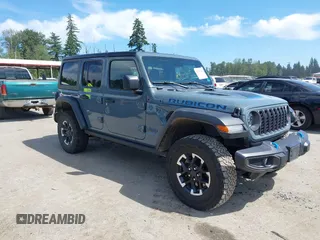 2024 Jeep Wrangler Rubicon X z VIN 1C4RJXR6XRW240316, wystawiony jako IAAI lot #42477607 z przebiegiem 41 375 mil mil oraz . Historia ofert i sprzedaży dostępna na DreamBid. Obrazek 1.