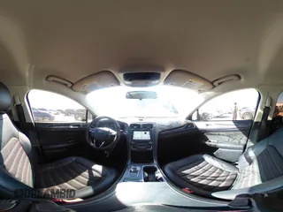 2018 Ford Fusion SE z VIN 3FA6P0H77JR180057, wystawiony jako IAAI lot #41729451 z przebiegiem 122 200 mil mil oraz . Historia ofert i sprzedaży dostępna na DreamBid. Obrazek 18.