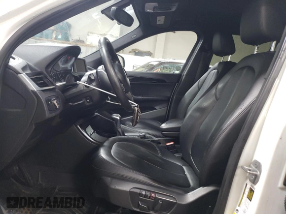 2016 BMW X1 xDrive28i with VIN WBXHT3C3XG5E51117, listed as a Copart auction lot 48243355 with 129,607 mi miles and Salvage Title. Bid and sale history available at carsss.com. Image 7.