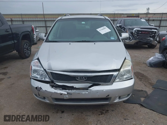 2012 Kia Sedona EX with VIN KNDMH4C74C6497243, listed as a IAAI auction lot 41368080 with 218,806 mi miles. Bid and sale history available at carsss.com. Image 12.