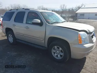 2011 GMC Yukon SLT z VIN 1GKS2CE03BR154461, wystawiony jako IAAI lot #41674252 z przebiegiem 149 378 mil mil oraz . Historia ofert i sprzedaży dostępna na DreamBid. Obrazek 1.