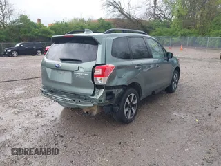 2018 Subaru Forester Premium with VIN JF2SJAEC5JH434174, listed as a IAAI auction lot 42106434 with 79,656 mi miles and . Bid and sale history available at DreamBid. Image 4.
