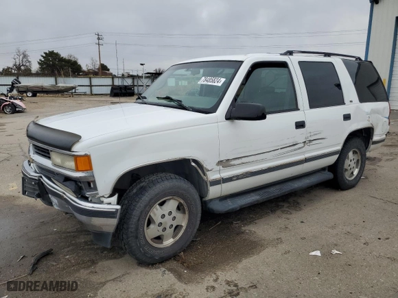 1995 Chevrolet Tahoe with VIN 1GNEK13K8SJ446856, listed as a Copart auction lot 78485824 with 167,005 mi miles and Salvage Title. Bid and sale history available at carsss.com. Image 1.