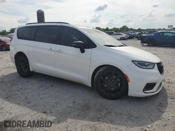 2024 Chrysler Pacifica Touring L with VIN 2C4RC1BG2RR116768, listed as a Copart auction lot 54598075 with 12,054 mi miles and Salvage title. Bid and sale history available at DreamBid. Image 4.