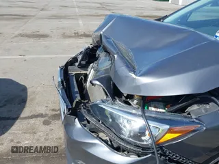 2018 Subaru Impreza Premium with VIN 4S3GTAD60J3705407, listed as a IAAI auction lot 42109867 with 74,014 mi miles and . Bid and sale history available at DreamBid. Image 6.