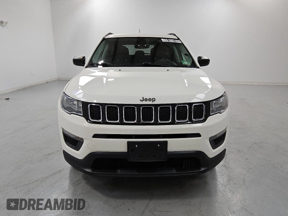 2018 Jeep Compass Sport z VIN 3C4NJDAB1JT306171, wystawiony jako Copart lot #55169745 z przebiegiem 54 489 mil mil oraz Czysty tytuł • Clean title. Historia ofert i sprzedaży dostępna na DreamBid. Obrazek 5.