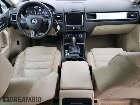 2011 Volkswagen Touareg Sport with VIN WVGFF9BP8BD002982, listed as a Copart auction lot 53958555 with 156,742 mi miles and Salvage Title. Bid and sale history available at DreamBid. Image 8.