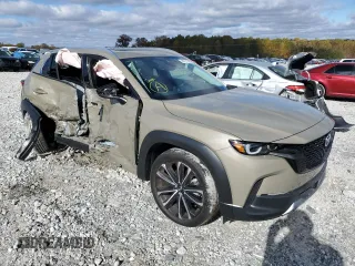2023 Mazda CX-50 Premium z VIN 7MMVABDY7PN111138, wystawiony jako Copart lot #64731582 z przebiegiem 3917 mil mil oraz . Historia ofert i sprzedaży dostępna na DreamBid. Obrazek 1.