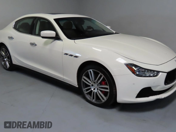 2014 Maserati Ghibli S Q4 z VIN ZAM57RTA7E1094580, wystawiony jako Copart lot #58866195 z przebiegiem 79 463 mil mil oraz Szkody całkowita. Historia ofert i sprzedaży dostępna na DreamBid. Obrazek 1.