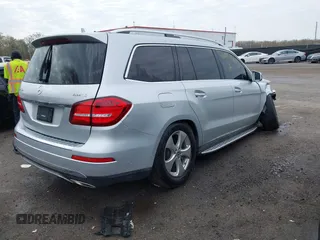 2017 Mercedes-Benz GLS 450 with VIN 4JGDF6EE9HA787099, listed as a IAAI auction lot 41971505 with 80,159 mi miles and . Bid and sale history available at DreamBid. Image 4.