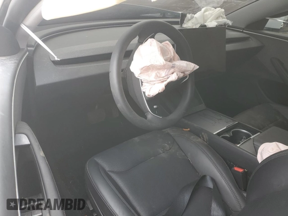 2025 Tesla Model 3 Long Range z VIN 5YJ3E1EA0SF903551, wystawiony jako Copart lot #49811045 z przebiegiem Nie podano mil oraz Szkoda całkowita • Salvage title. Historia ofert i sprzedaży dostępna na DreamBid. Obrazek 8.