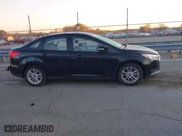 2017 Ford Focus SE with VIN 1FADP3FE7HL298287, listed as a IAAI auction lot 41870698 with Not Provided miles and . Bid and sale history available at carsss.com. Image 12.