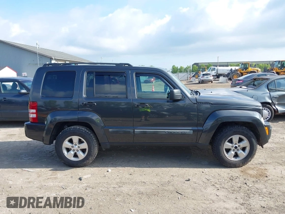 2010 Jeep Liberty Sport with VIN 1J4PN2GK8AW166388, listed as a IAAI auction lot 42661393 with 201,069 mi miles and . Bid and sale history available at DreamBid. Image 14.