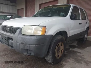2004 Ford Escape XLS with VIN 1FMYU02134DA08567, listed as a IAAI auction lot 41872076 with 239,602 mi miles and . Bid and sale history available at DreamBid. Image 2.