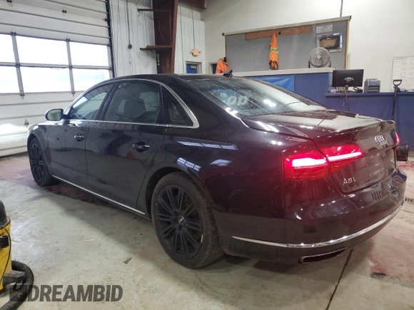 2015 Audi A8 L 4.0T with VIN WAU32AFD3FN036507, listed as a Copart auction lot 82298094 with 77,156 mi miles and Salvage Title. Bid and sale history available at carsss.com. Image 2.