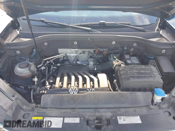 2018 Volkswagen Atlas SE with VIN 1V2CR2CA1JC561003, listed as a IAAI auction lot 42556798 with 124,147 mi miles and . Bid and sale history available at DreamBid. Image 10.