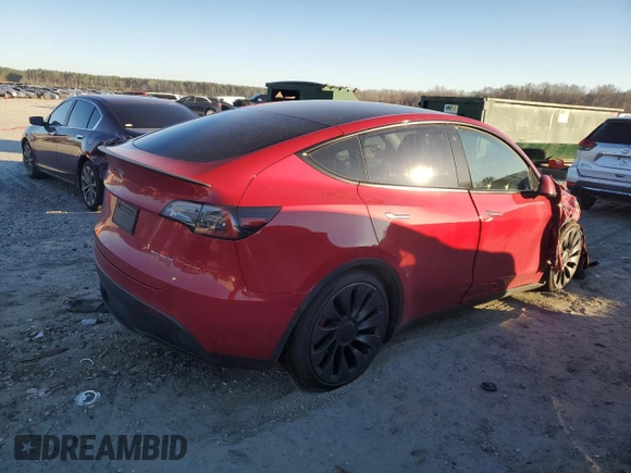 2022 Tesla Model Y Performance with VIN 7SAYGDEF2NF323142, listed as a Copart auction lot 48218235 with 43,524 mi miles and Salvage Title. Bid and sale history available at DreamBid. Image 3.