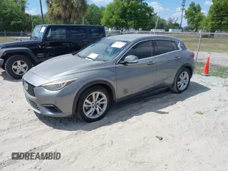 2018 Infiniti QX30 Premium z VIN SJKCH5CPXJA003377, wystawiony jako IAAI lot #41876556 z przebiegiem 91 673 mil mil oraz . Historia ofert i sprzedaży dostępna na DreamBid. Obrazek 20.