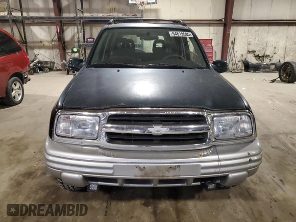 2002 Chevrolet Tracker LT z VIN 2CNBJ634126949974, wystawiony jako Copart lot #54819695 z przebiegiem 200 895 mil mil oraz Szkoda całkowita • Salvage title. Historia ofert i sprzedaży dostępna na DreamBid. Obrazek 5.