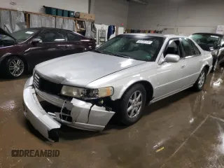 2002 Cadillac Seville Touring STS z VIN 1G6KY54962U298396, wystawiony jako Copart lot #85769174 z przebiegiem 181 416 mil mil oraz Szkoda całkowita • Salvage title. Historia ofert i sprzedaży dostępna na DreamBid. Obrazek 1.