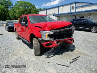 2019 Ford F-150 XL with VIN 1FTEW1E43KKE28982, listed as a Copart auction lot 58302285 with 101,707 mi miles and Salvage title. Bid and sale history available at DreamBid. Image 14.