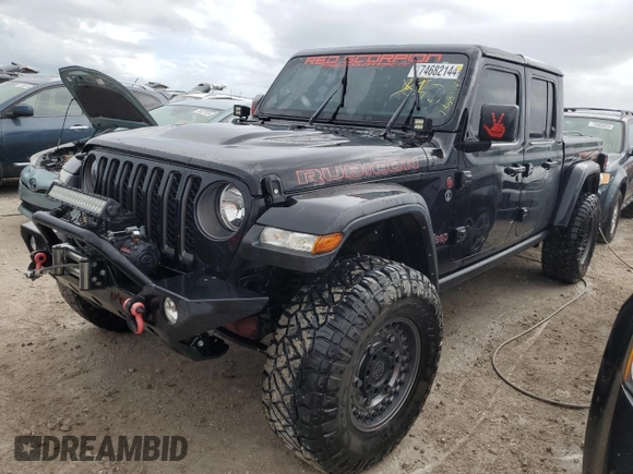 2022 Jeep Gladiator Rubicon with VIN 1C6JJTBG5NL101657, listed as a Copart auction lot 74682144 with 13,352 mi miles and Non repairable. Bid and sale history available at DreamBid. Image 1.