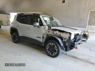 2016 Jeep Renegade Trailhawk with VIN ZACCJBCT3GPD16931, listed as a Copart auction lot 61857235 with 52,490 mi miles and Salvage title. Bid and sale history available at DreamBid. Image 4.